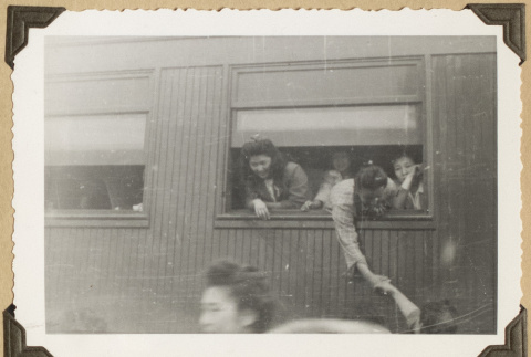 Saying goodbye from a train (ddr-densho-542-483)