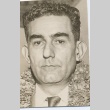 Man wearing leis (ddr-njpa-2-941)