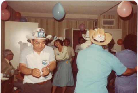 Scene at a hoedown themed party at the 1980 JACL National Convention (ddr-densho-10-47)
