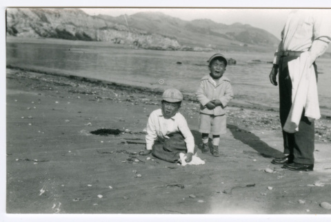 Susumu and Tory Miyoshi at beach (ddr-densho-480-157)