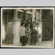 Group photograph in front of house (ddr-densho-359-842)