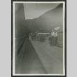 People walking on boardwalk (ddr-densho-540-87)