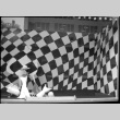 Large window display with checkered background (ddr-densho-426-2293)