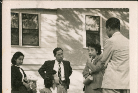 Group talking on lawn (ddr-densho-293-166)