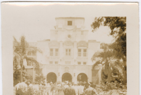 Group walking into large hotel (ddr-densho-426-1945)