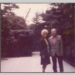 Agnes and Chester Sakura standing on walkway (ddr-densho-523-563)