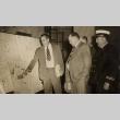 Man explaining city planning project to others (ddr-njpa-2-430)