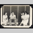 Four adults outside a barrack (ddr-densho-542-739)