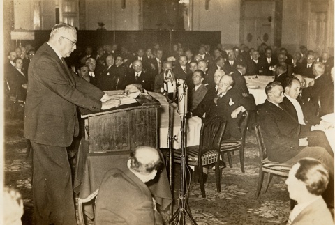 A man giving a speech at a dinner (ddr-njpa-1-2355)