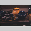 Display of enamelware pots and cups (ddr-densho-426-351)