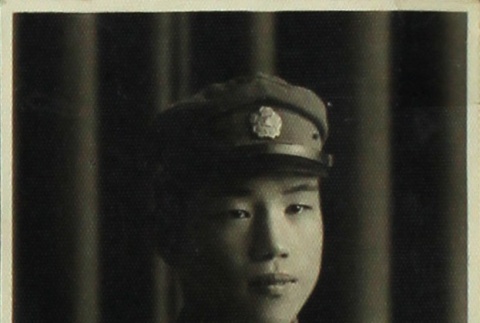 Young man in school uniform (ddr-densho-252-51)