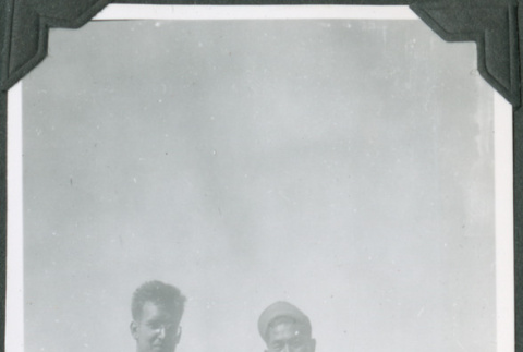 Two men standing by railing on ship.  Joe Iwataki on right (ddr-ajah-2-647)
