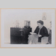 Betty reading (ddr-densho-462-273)