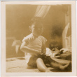 Young boy sitting on table (ddr-densho-426-2123)