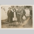 Four women and a girl in front of a house (ddr-densho-338-208)
