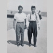 Two young men at Huntington Beach (ddr-densho-513-6)