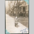 Toddler walking down the sidewalk (ddr-densho-328-261)