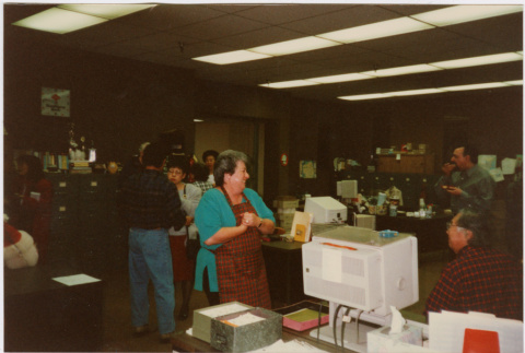 Group standing in office (ddr-densho-426-1299)