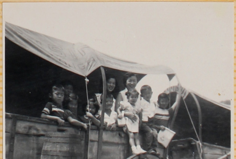 Group in covered wagon (ddr-densho-522-292)