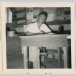 Bunji Ikanouye at a desk (ddr-densho-37-860)