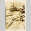 Men loading cargo at a dock (ddr-njpa-13-600)
