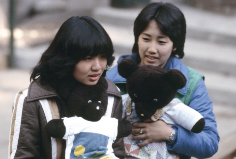 Naomi Takagi carrying a teddy bear (ddr-densho-336-1260)