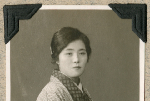 Seated woman in kimono (ddr-densho-383-145)