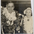 Man and woman wearing leis (ddr-njpa-2-859)