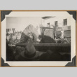 Two women on a parade float (ddr-densho-542-44)