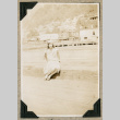 Woman sitting on boardwalk (ddr-densho-383-197)