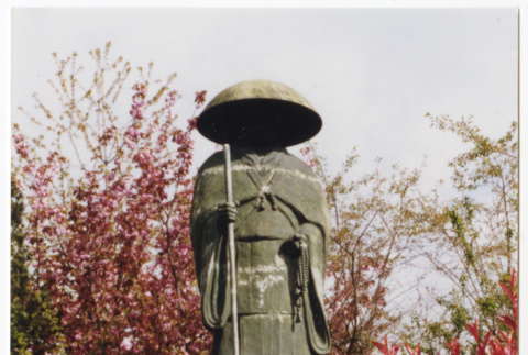 Shinran statue among greenery (ddr-sbbt-4-186)