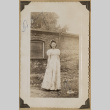 Betty Miyaguchi posing in a puff sleeve dress (ddr-densho-542-397)