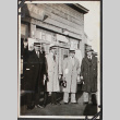 Four men standing in front of building (ddr-densho-326-209)