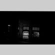 Nighttime photo of Golden Poppy Ice Cream Shop (ddr-densho-426-1827)