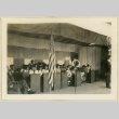Musicians wait on a stage on Armistice Day (ddr-densho-37-1152)