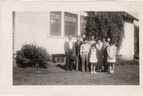 Morita Family outside Dethman's house the day they left Pinedale Assembly Center (ddr-densho-409-67)