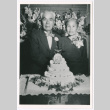 Kazuo Masuda's parents with tiered cake (ddr-densho-1007-13)