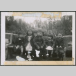 Five children sitting on park bench (ddr-densho-483-1010)