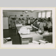 Preparing lunch in a home economics kitchen (ddr-densho-37-1122)
