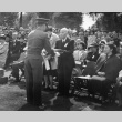 Man receiving flag (ddr-densho-1007-459)