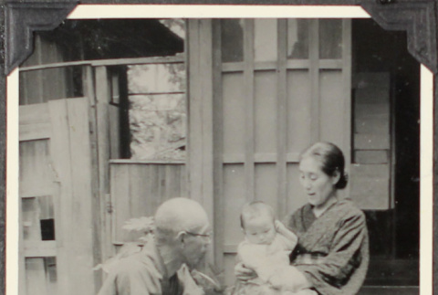 Man and woman with baby (ddr-densho-355-835)
