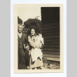 Grandparents holding baby Aiko (ddr-one-6-7)