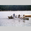 Stuart Wong trying to retrieve a bag in the water (ddr-densho-336-885)