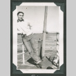 Man leaning on railing (ddr-densho-540-104)
