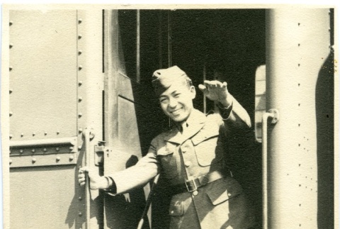 Herbert K. Yanamura on a train (ddr-densho-22-380)