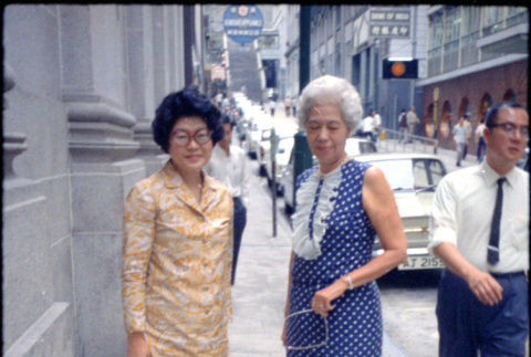 Martha (Nozawa) Tsuchida and unknown woman standing on sidewalk (ddr-densho-426-742)