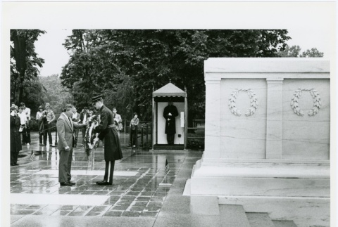 Frank Sato at Tomb of the Unknown Soldier (ddr-densho-345-34)