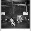 Men playing basketball (ddr-ajah-5-34)