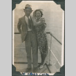 Couple standing by railing overlooking water (ddr-densho-316-341)