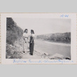 Two women standing by river (ddr-densho-464-32)